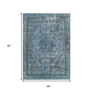HomeRoots 5' Stylish Blue and Gray Medallion Area Rug - Durable, Washable Design for Indoor and Outdoor Spaces 5' X 8' 616053
