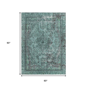 HomeRoots 5' Vibrant Teal Blue Medallion Area Rug for Indoor & Outdoor Spaces – Durable, Washable & Stylish 5' X 8' 616077