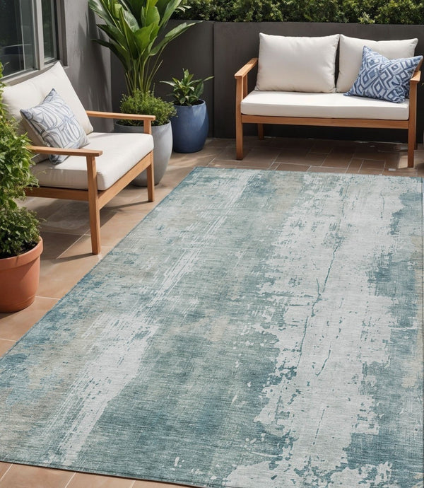 HomeRoots 5' Turquoise and Ivory Abstract Area Rug - Machine Washable, Durable for Indoor and Outdoor Use 5' X 8' 616203