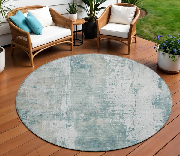 HomeRoots 5' Turquoise and Ivory Abstract Area Rug - Machine Washable, Durable for Indoor and Outdoor Use 8' Round 616204