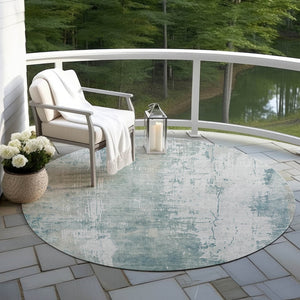 HomeRoots 5' Turquoise and Ivory Abstract Area Rug - Machine Washable, Durable for Indoor and Outdoor Use 8' Round 616204