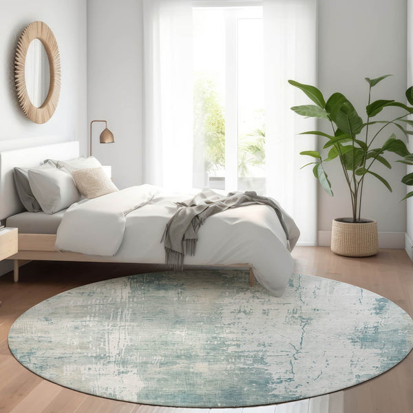 HomeRoots 5' Turquoise and Ivory Abstract Area Rug - Machine Washable, Durable for Indoor and Outdoor Use 8' Round 616204