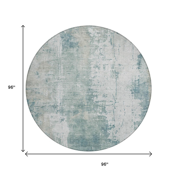 HomeRoots 5' Turquoise and Ivory Abstract Area Rug - Machine Washable, Durable for Indoor and Outdoor Use 8' Round 616204