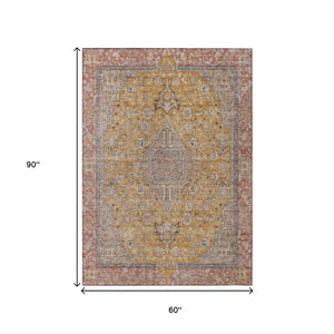 HomeRoots 5' Gold and Peach Medallion Indoor Outdoor Area Rug - Timeless Design, Easy Care, and Versatile Use 5' X 8' 616269