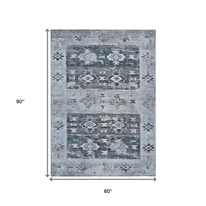 HomeRoots 5' Blue and Denim Blue Aztec Indoor Outdoor Area Rug - Stylish, Washable, and Durable for Any Space 5' X 8' 616593