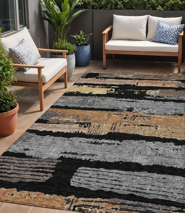 HomeRoots 5' Contemporary Black Gold and Brown Striped Washable Area Rug for Indoor and Outdoor Spaces 5' X 8' 616641
