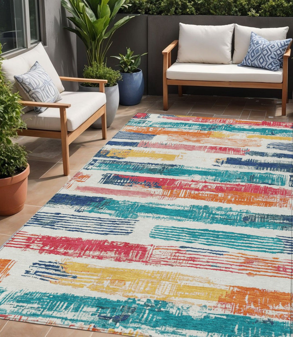 HomeRoots 5' Vibrant Striped Washable Area Rug in Ivory, Teal, Blue, Orange, and Red for Indoor/Outdoor Use 5' X 8' 616653