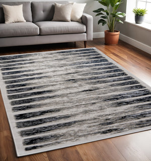 Homeroots 5' X 8' Abstract Distressed Area Rug - Stylish Bohemian Design, Stain-resistant, Perfect For Homes Gray,Black Polyester Blend 616893