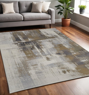 Homeroots 6' X 9' Abstract Area Rug - Stylish Bohemian Design, Stain Resistant, Perfect For Homes With Kids & Pets Gray,Brown Polyester Blend 616899