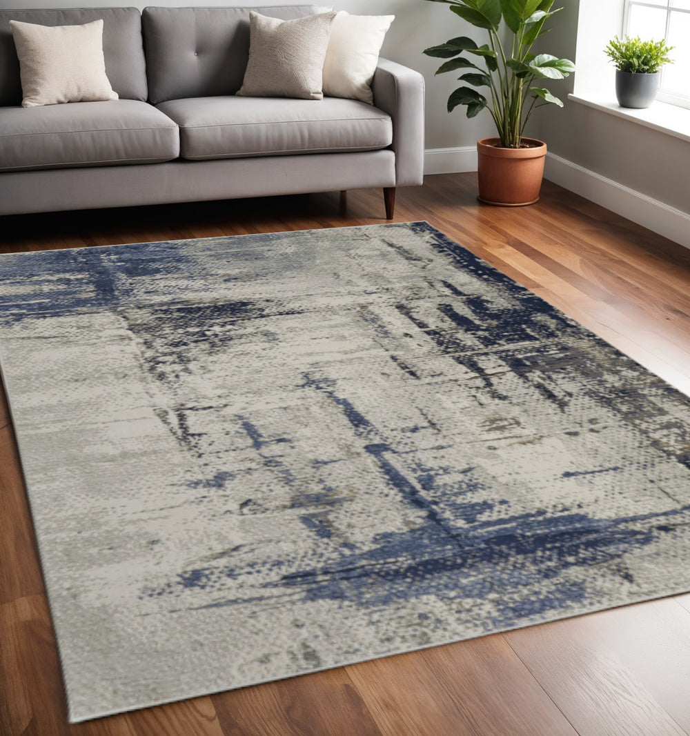 Homeroots 6' X 9' Abstract Area Rug - Stylish, Stain Resistant, Perfect For Families And Pets In Any Room Gray,Ivory Polyester Blend 616903