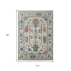 Homeroots 12' Hand Knotted Area Rug In Ivory Blue & Pink Floral Design - Stain Resistant, Bohemian Chic Decor Ivory,Blue,Pink Wool Blend 616988