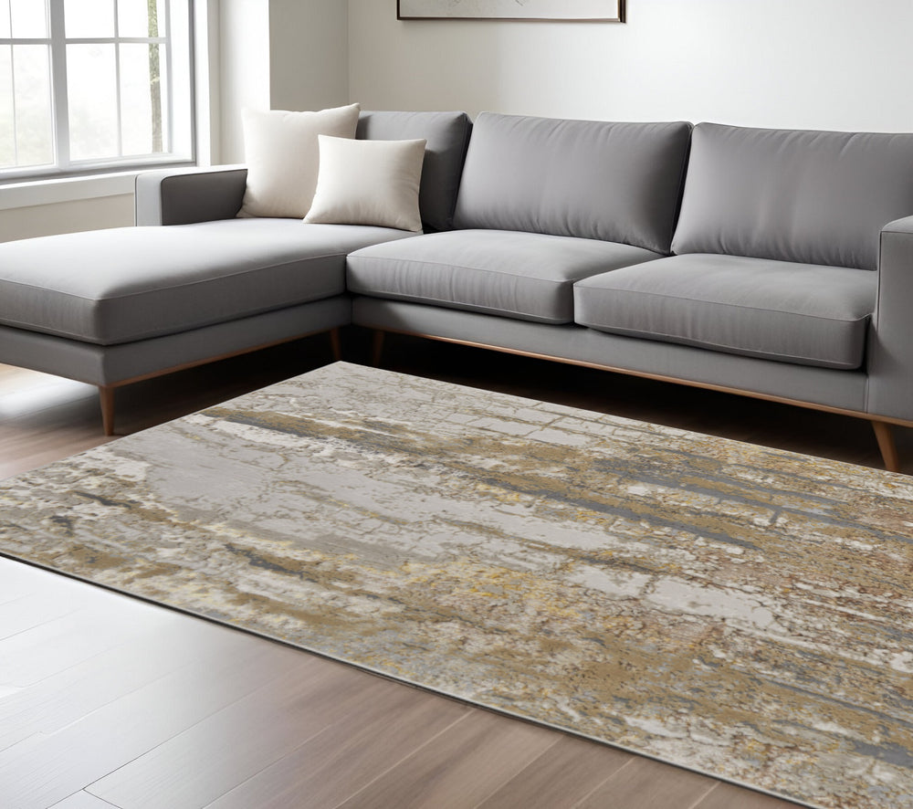 Homeroots 12' Stylish Ivory Gold & Brown Abstract Area Rug - Stain Resistant, Perfect For Kids & Pets 144"X216" Ivory,Gold,Brown Polyester Blend 616998