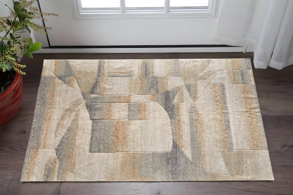 Homeroots 10' X 14' Abstract Area Rug - Luxurious Wool Blend, Stain Resistant, Perfect For Kids & Pets Tan,Brown,Gray Wool Blend 617015