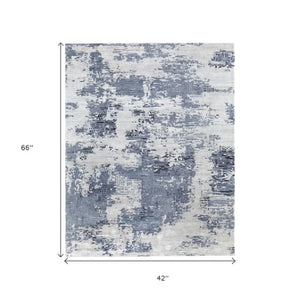 Homeroots 10' Hand Tufted Abstract Area Rug - Unique Artisan Crafted Design For Style And Comfort In Any Room Blue,Ivory Wool Blend 617034
