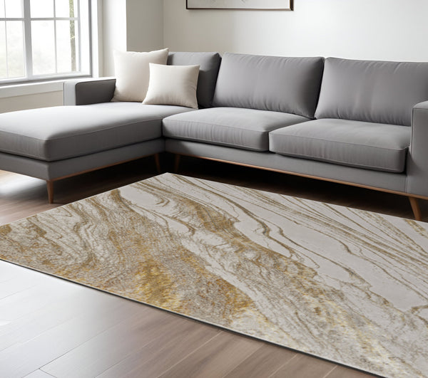 Homeroots 9' X 12' Ivory Taupe & Gold Abstract Area Rug - Stain Resistant, Stylish, Soft Texture For Any Room Ivory,Taupe,Gold Polyester Blend 617238