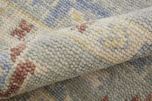 Homeroots 12' Hand Knotted Floral Runner Rug With Fringe - Stain Resistant Wool Blend For Stylish Home Décor Blue,Taupe,Gray Wool Blend 617258