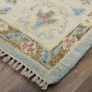 Homeroots 9' Blue Ivory Yellow Floral Hand Knotted Area Rug With Fringe - Stain Resistant, Artisan Crafted Beauty Blue,Ivory,Yellow Wool Blend 617281