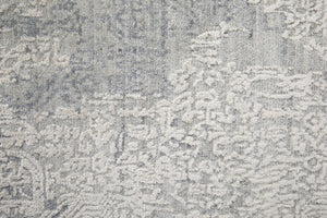 Homeroots 9' X 12' Silver And Gray Abstract Hand Woven Distressed Area Rug – Unique Artisan Craftsmanship! Silver,Gray Wool Blend 617283