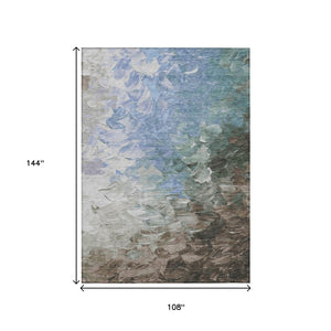 HomeRoots 5' Elevate Your Space with a Stylish Denim Blue and Taupe Abstract Washable Indoor/Outdoor Rug 9' X 12' 617351