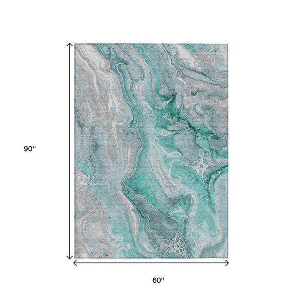 HomeRoots 5' Teal Blue and Ivory Abstract Area Rug - Durable, Washable Design for Indoor and Outdoor Spaces 5' X 8' 617615