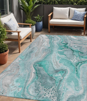 HomeRoots 5' Teal Blue and Ivory Abstract Area Rug - Durable, Washable Design for Indoor and Outdoor Spaces 5' X 8' 617615