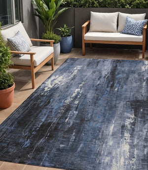 HomeRoots 5' Blue and Ivory Abstract Area Rug - Stylish, Durable, and Washable for Indoor/Outdoor Use 5' X 8' 617651