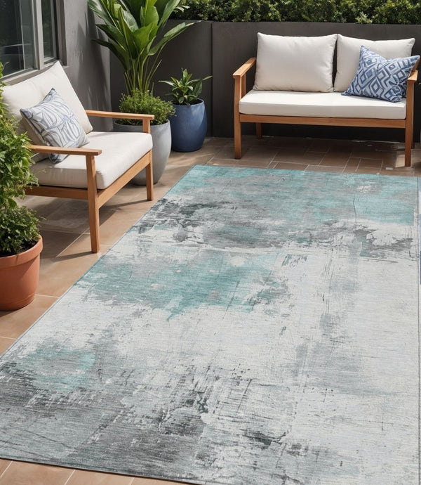 HomeRoots 5' Teal Blue and Gray Abstract Area Rug - Modern, Washable Indoor-Outdoor Design for Versatile Spaces 5' X 8' 617741