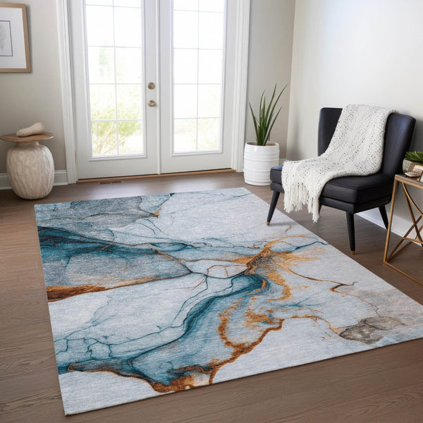 HomeRoots 5' Sky Blue and Copper Abstract Area Rug - Stylish, Washable Design for Indoor and Outdoor Use 5' X 8' 617873