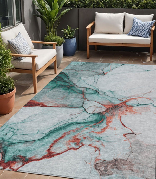 HomeRoots 5' Abstract Teal Blue and Terra Cotta Washable Area Rug for Indoor and Outdoor High-Traffic Spaces 5' X 8' 617879