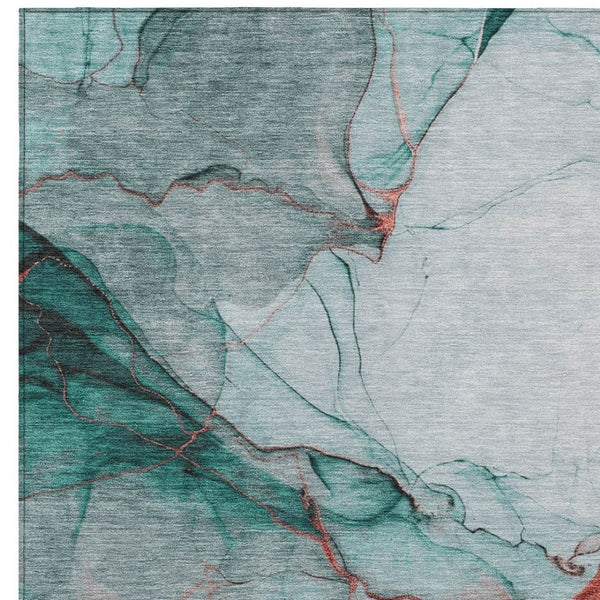 HomeRoots 5' Abstract Teal Blue and Terra Cotta Washable Area Rug for Indoor and Outdoor High-Traffic Spaces 8' X 10' 617881