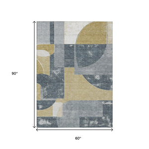 HomeRoots 5' Gray and Gold Geometric Indoor-Outdoor Area Rug - Durable, Washable, Modern Style for Any Space 5' X 8' 617915
