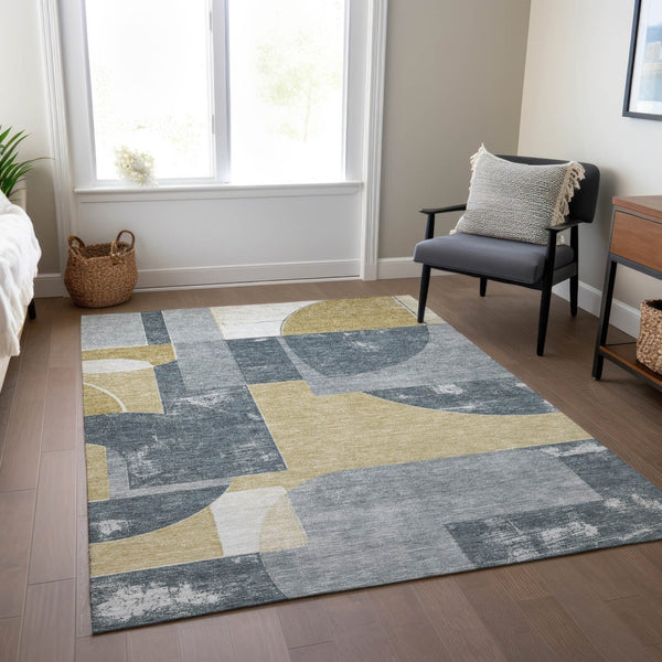 HomeRoots 5' Gray and Gold Geometric Indoor-Outdoor Area Rug - Durable, Washable, Modern Style for Any Space 5' X 8' 617915