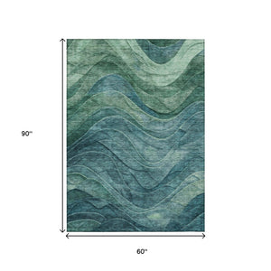 HomeRoots 5' Vibrant Teal Blue and Green Abstract Indoor-Outdoor Area Rug for Stylish, Low-Maintenance Living 5' X 8' 618179