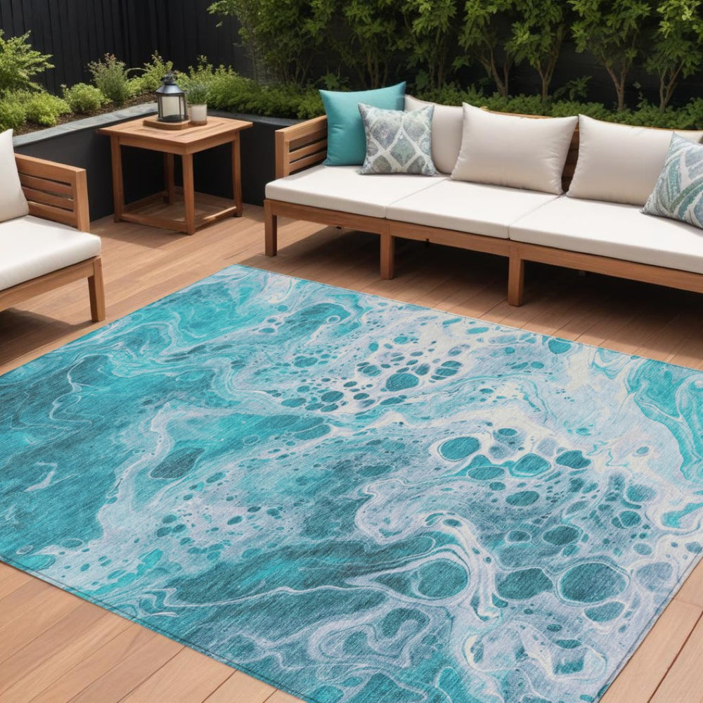 HomeRoots 5' Teal Blue and Ivory Abstract Area Rug – Stylish, Washable, Indoor/Outdoor Rug for Everyday Use 10' X 14' 618327
