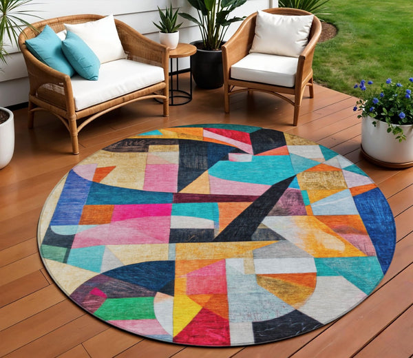 HomeRoots 8' Vibrant Round Area Rug in Blue, Orange, Pink & Yellow - Washable for Indoor & Outdoor Use! 619971