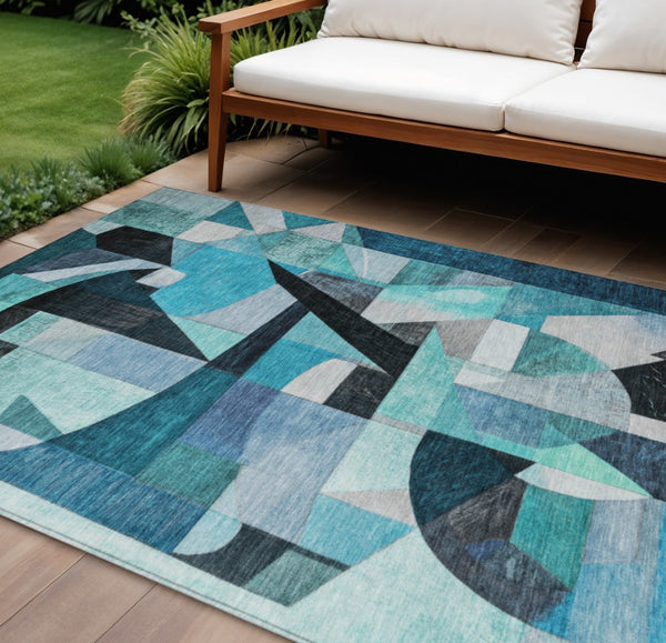 HomeRoots 9' X 12' Teal Blue Abstract Washable Area Rug for Indoor & Outdoor Use, Durable & Stylish Design 619997