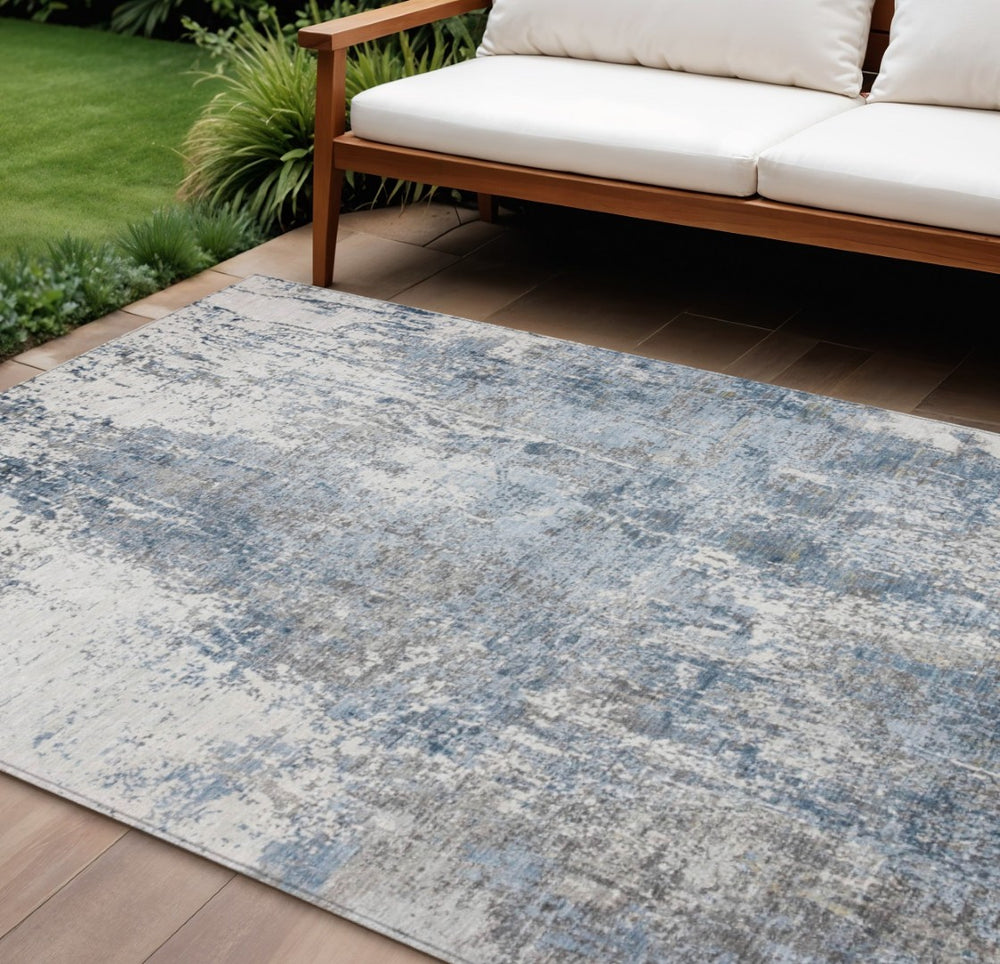 HomeRoots 8' X 10' Blue and Ivory Abstract Washable Area Rug – Durable, Stylish, Indoor/Outdoor Versatility! 620302