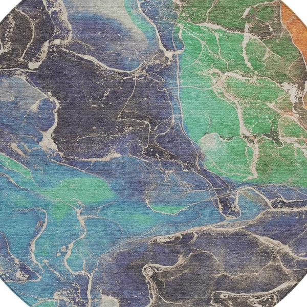 HomeRoots 8' Vibrant Blue Green and Orange Round Abstract Area Rug - Washable, Durable, Indoor/Outdoor Style! 620823