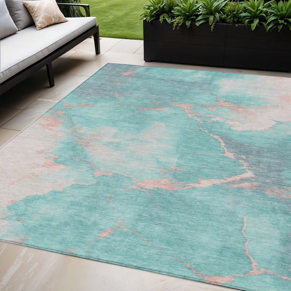 HomeRoots 5' Stylish Teal Blue, Peach & Ivory Abstract Washable Indoor/Outdoor Area Rug for Versatile Spaces 621093