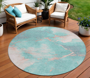 HomeRoots 8' Teal Blue Peach & Ivory Round Abstract Area Rug - Durable, Washable, Perfect for Indoor & Outdoor Spaces 621094