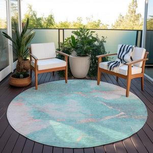 HomeRoots 8' Teal Blue Peach & Ivory Round Abstract Area Rug - Durable, Washable, Perfect for Indoor & Outdoor Spaces 621094