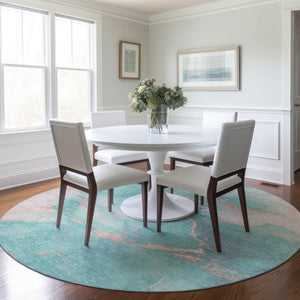 HomeRoots 8' Teal Blue Peach & Ivory Round Abstract Area Rug - Durable, Washable, Perfect for Indoor & Outdoor Spaces 621094