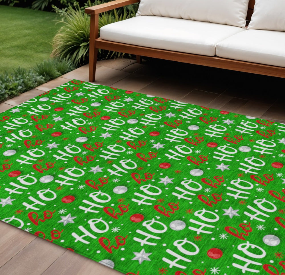 HomeRoots 9' X 12' Ho Ho Ho Indoor Outdoor Area Rug - Festive Green, White, & Red, Durable, Washable Design 621248