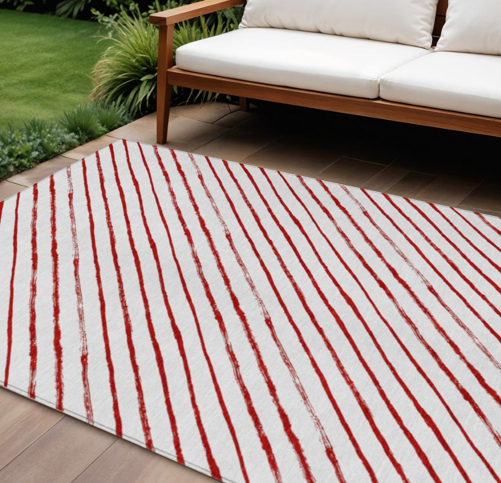 HomeRoots 10' Red and White Striped Washable Area Rug - Versatile Indoor/Outdoor Design for High-Traffic Spaces 621501