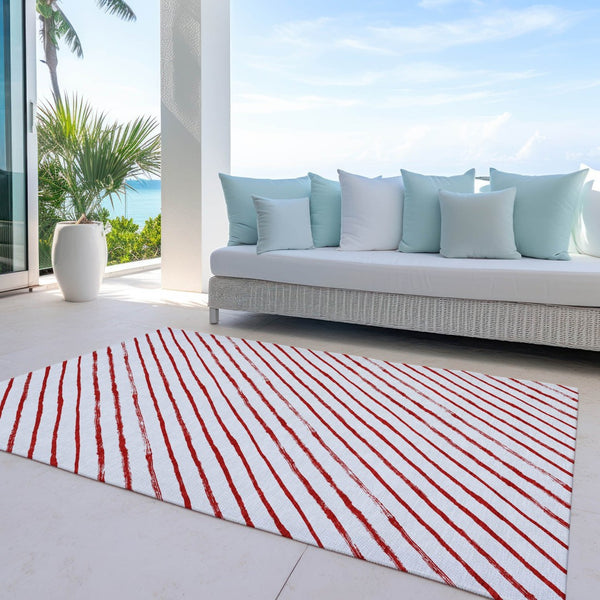 HomeRoots 10' Red and White Striped Washable Area Rug - Versatile Indoor/Outdoor Design for High-Traffic Spaces 621501