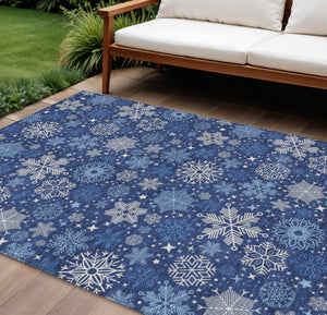 HomeRoots 10' Navy Blue Snowflake Indoor Outdoor Area Rug - Washable, Durable, Versatile for Home & Patio Spaces 621639