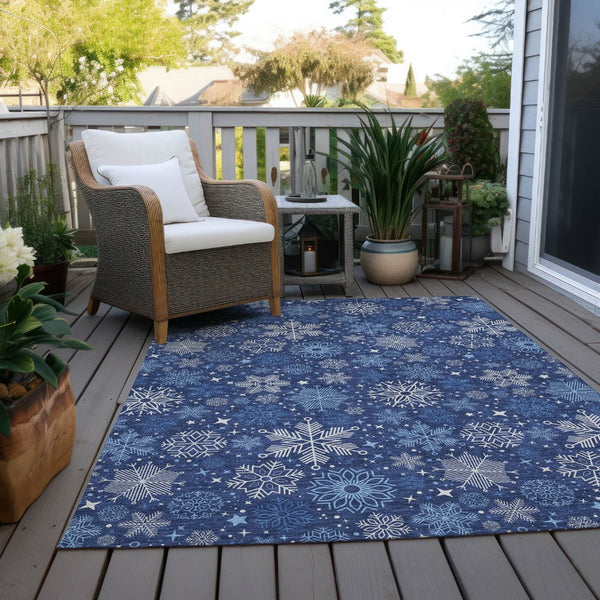HomeRoots 10' Navy Blue Snowflake Indoor Outdoor Area Rug - Washable, Durable, Versatile for Home & Patio Spaces 621639