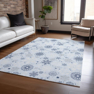 HomeRoots 10' Sky Blue and Navy Snowflake Area Rug – Washable, Durable Design for Indoor and Outdoor Use! 621651
