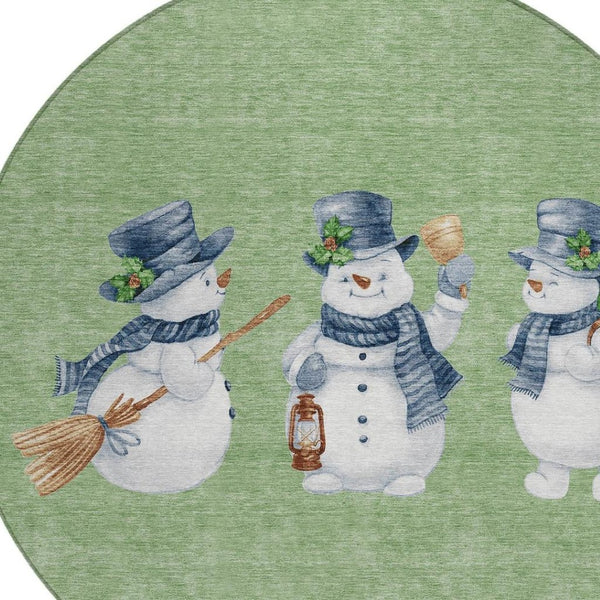 HomeRoots 8' Washable Round Area Rug with Snowmen Motif in Artichoke Green, Denim Blue & Ivory for Indoors & Outdoors 621738
