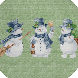 HomeRoots 8' Washable Round Area Rug with Snowmen Motif in Artichoke Green, Denim Blue & Ivory for Indoors & Outdoors 621738